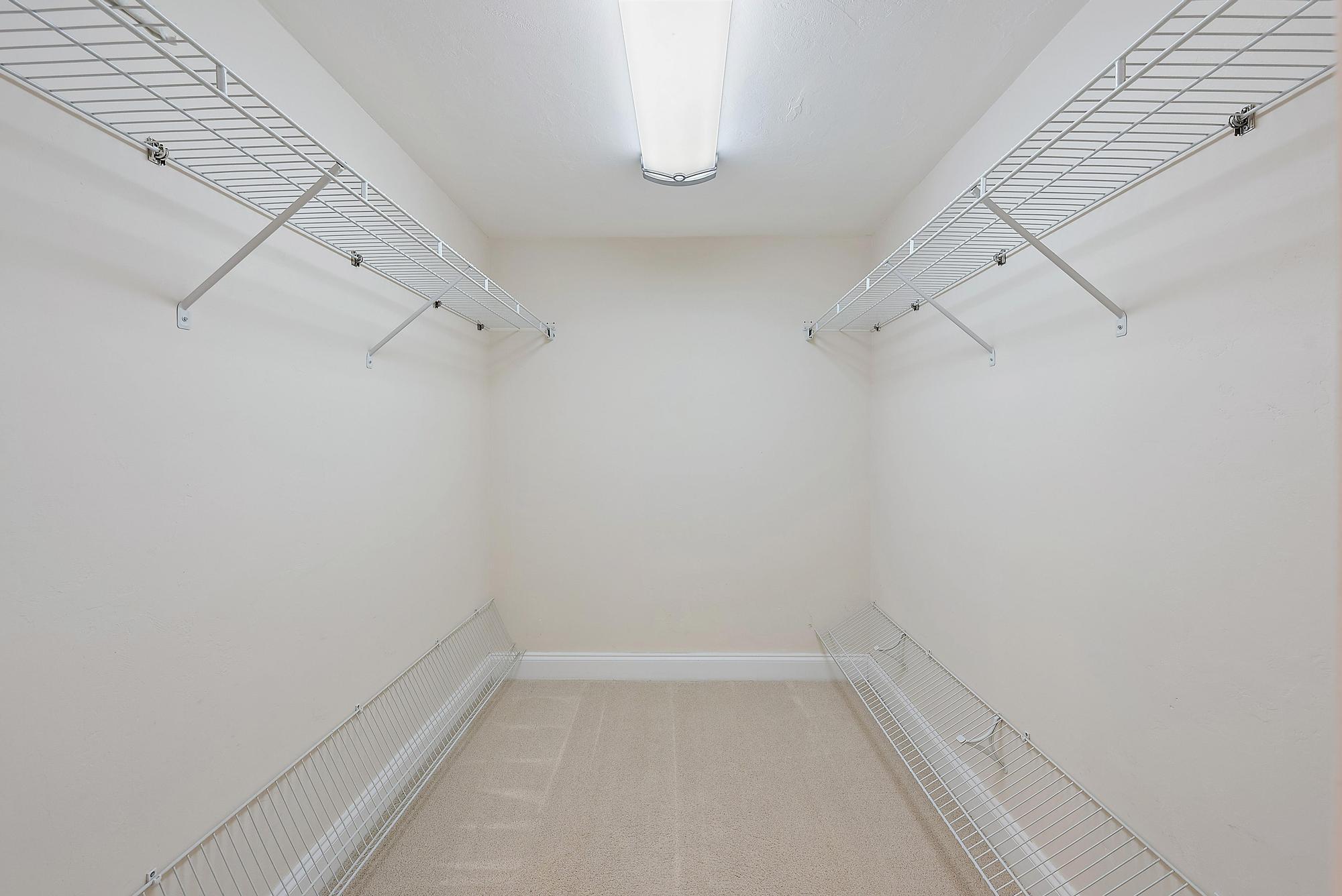 350 South Beach Road, Unit 503 Tequesta, FL 33469 - Photo 25 of 51 a view of a room with racks on the wall