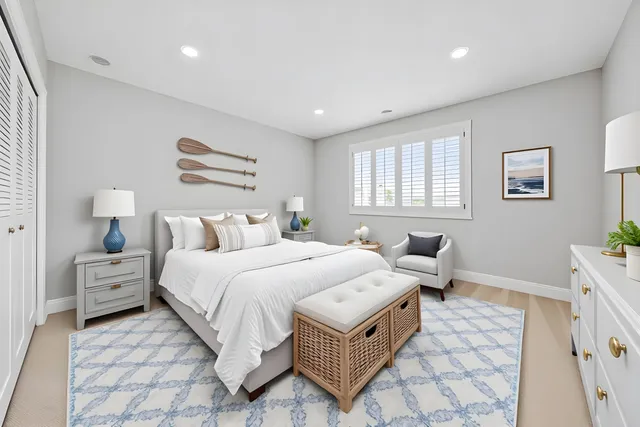 a bed room with bed and a window