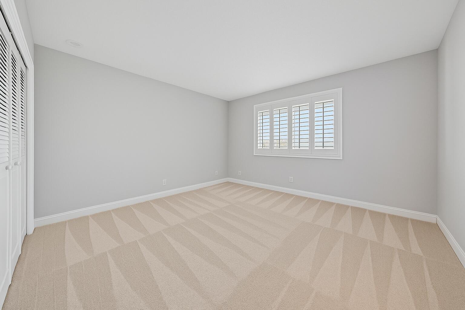 350 South Beach Road, Unit 503 Tequesta, FL 33469 - Photo 28 of 51 a view of an empty room with a window