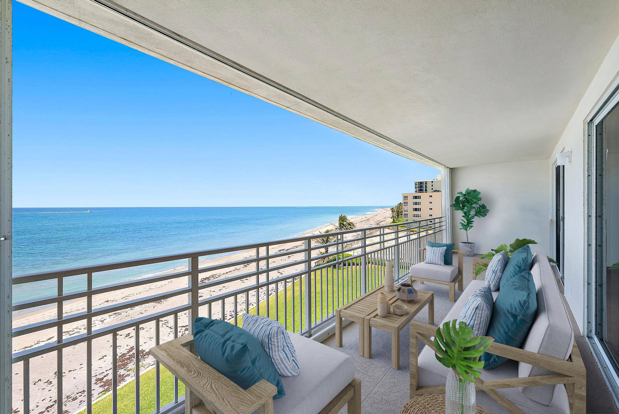 350 South Beach Road, Unit 503 Tequesta, FL 33469 - Photo 32 of 51 a balcony with furniture and potted plants