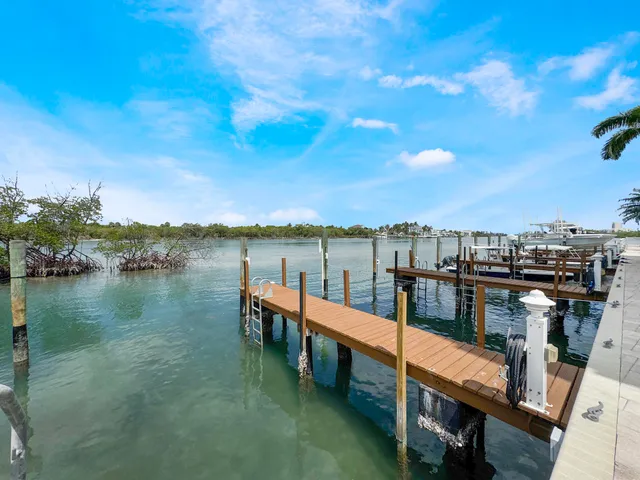 a view of a lake with sitting area