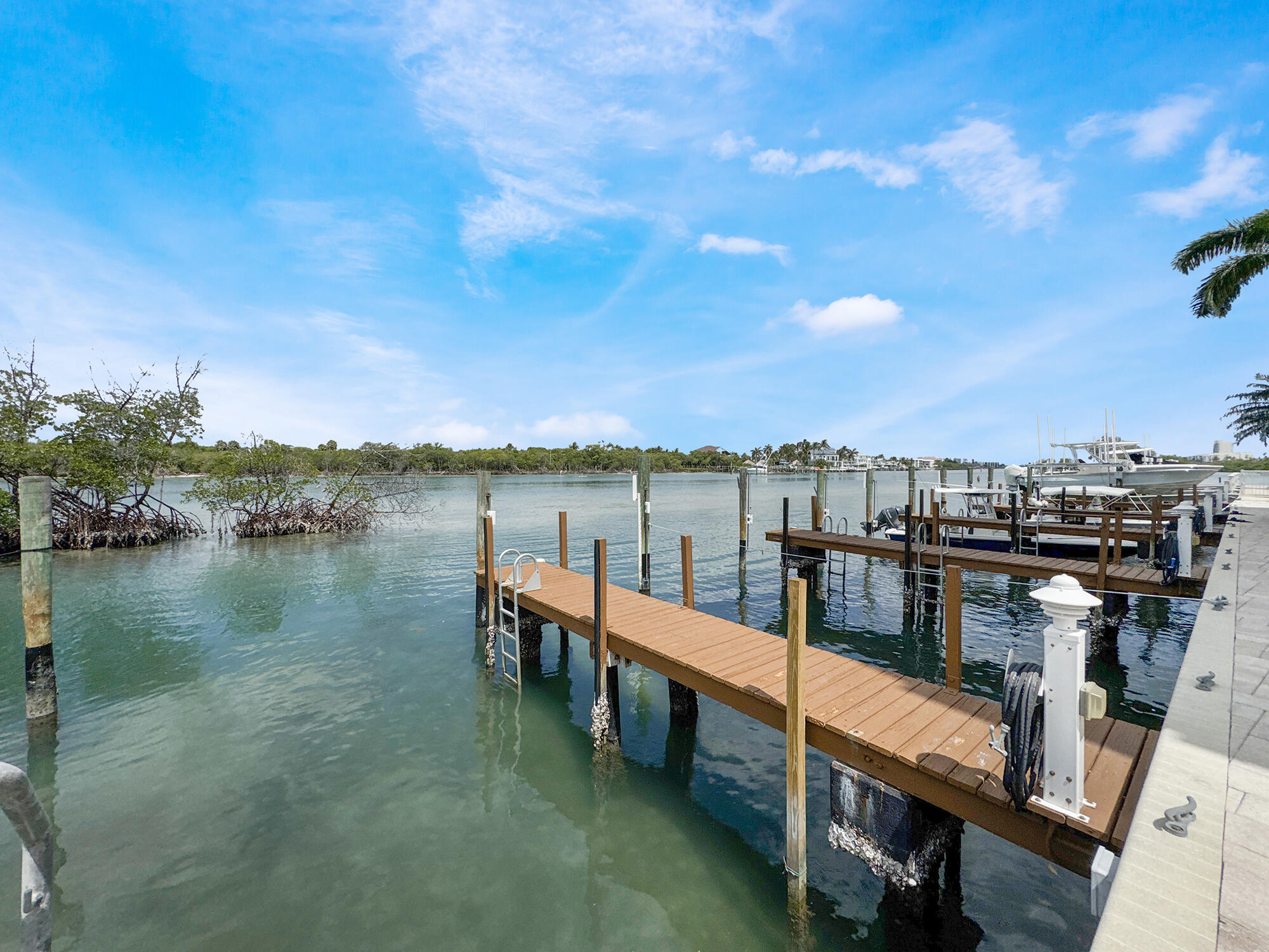 350 South Beach Road, Unit 503 Tequesta, FL 33469 - Photo 35 of 51 a view of a lake with sitting area