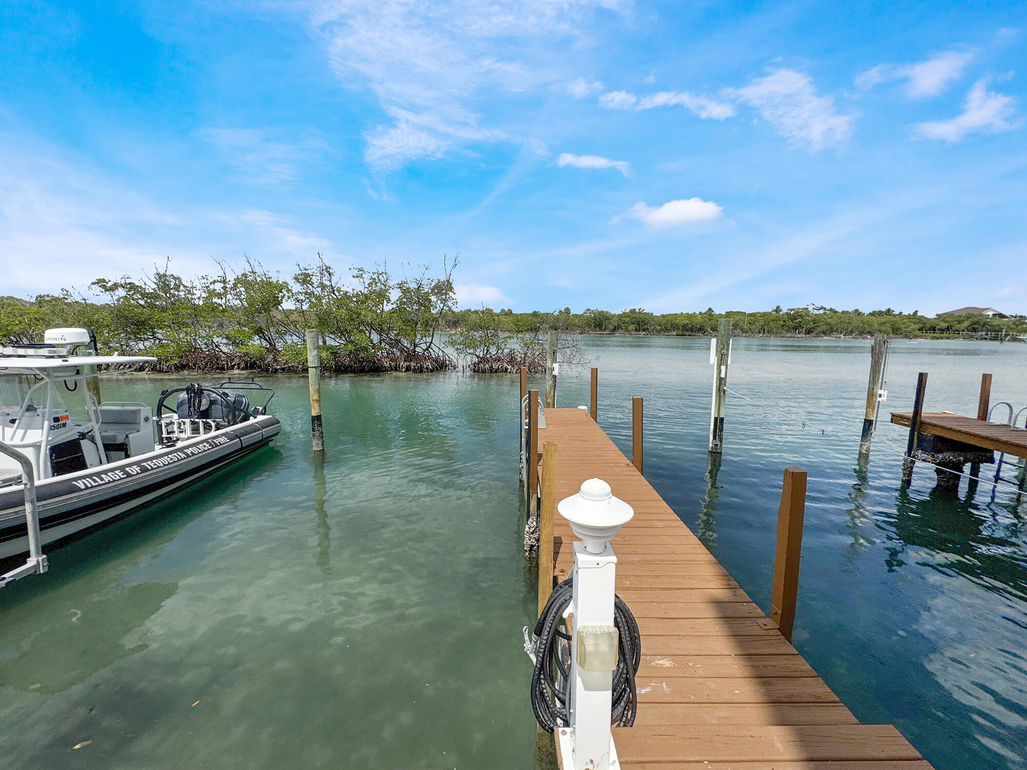 350 South Beach Road, Unit 503 Tequesta, FL 33469 - Photo 36 of 51 a view of a lake with a terrace