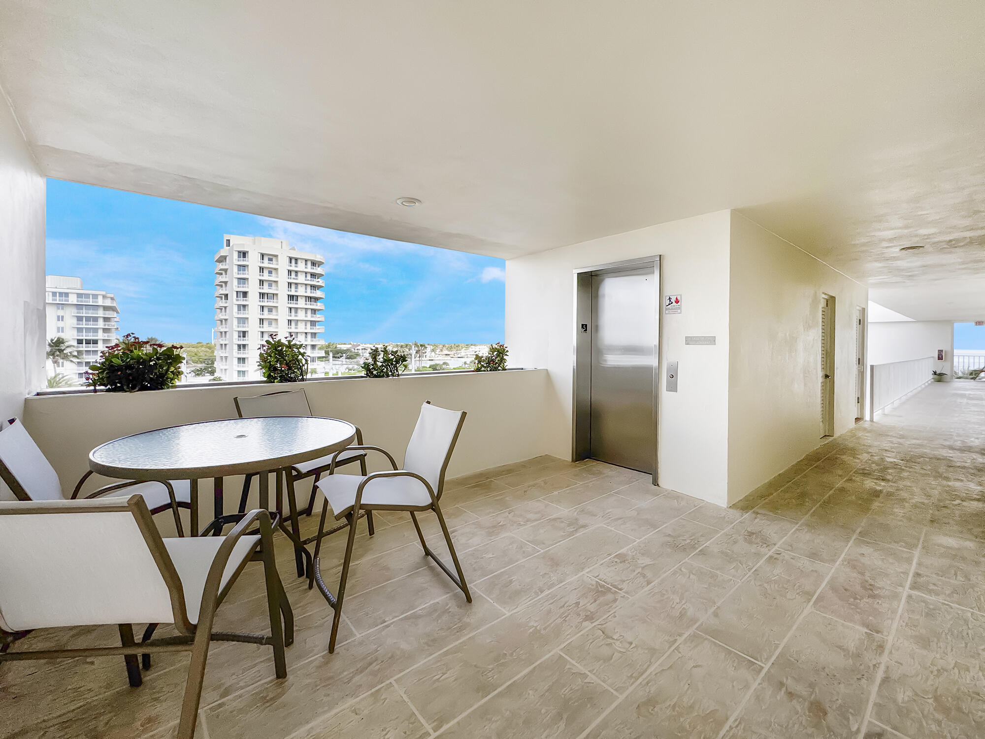 350 South Beach Road, Unit 503 Tequesta, FL 33469 - Photo 38 of 51 a view of a dining room with furniture and a chandelier