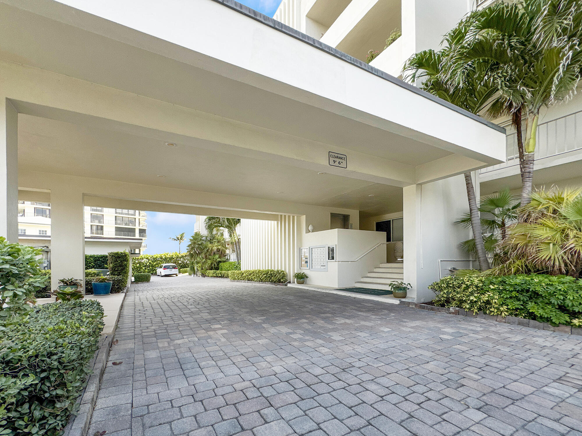 350 South Beach Road, Unit 503 Tequesta, FL 33469 - Photo 46 of 51 a view of a house with a backyard
