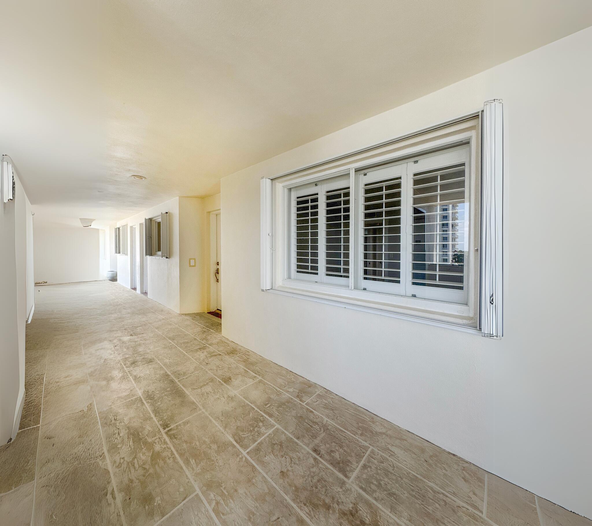350 South Beach Road, Unit 503 Tequesta, FL 33469 - Photo 49 of 51 a view of empty room with a window