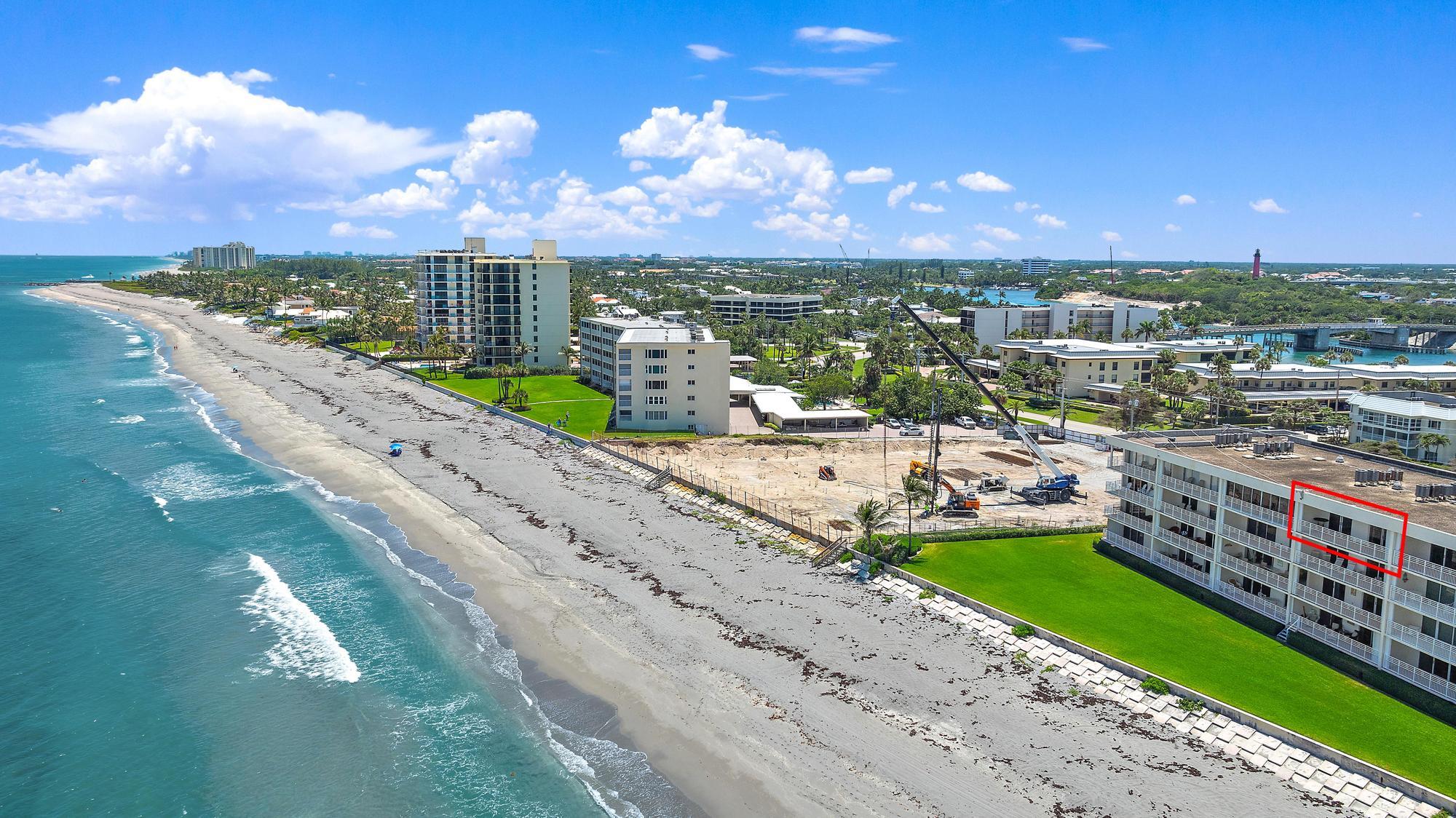 350 South Beach Road, Unit 503 Tequesta, FL 33469 - Photo 50 of 51 a view of a city with tall buildings