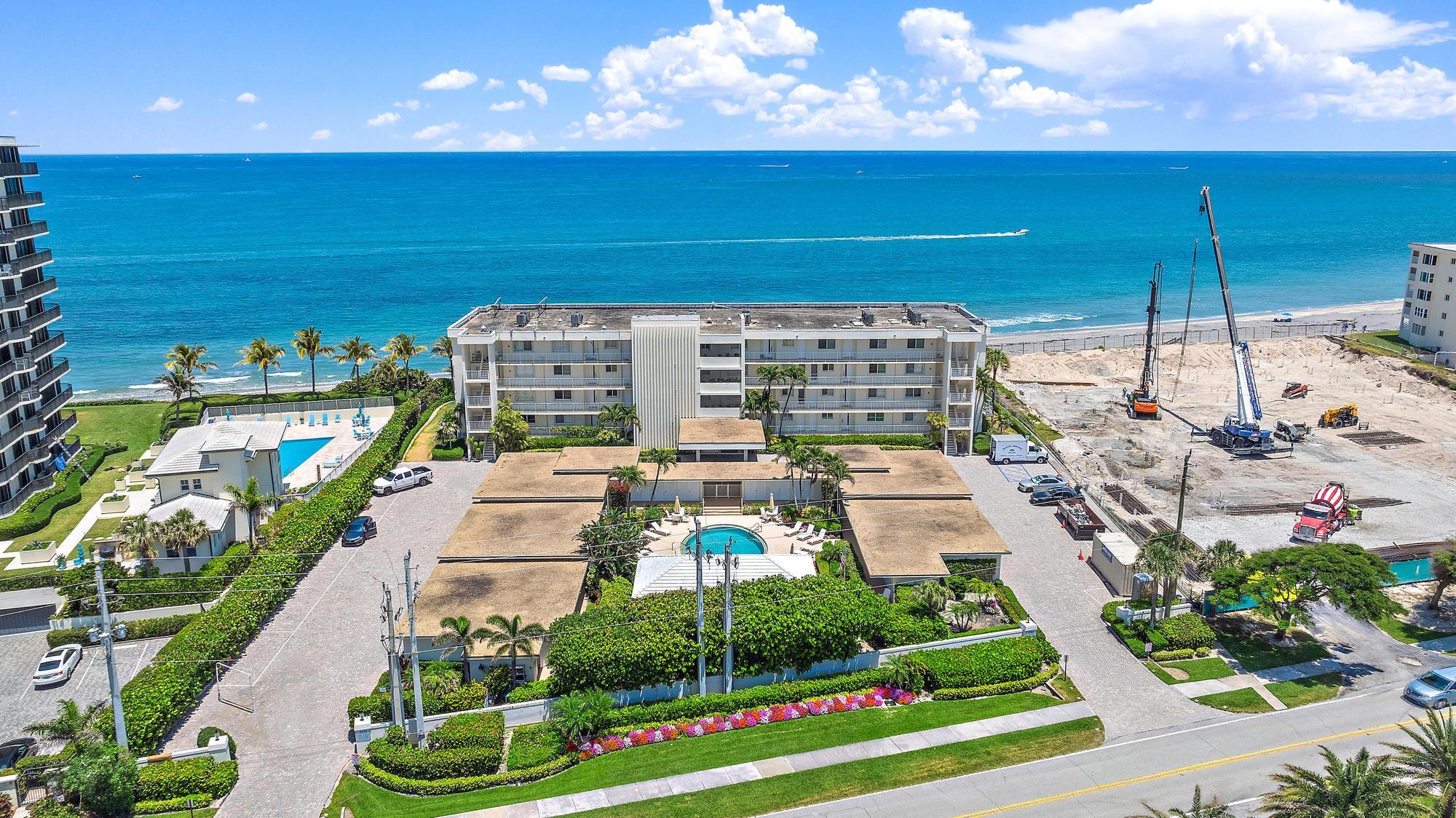 350 South Beach Road, Unit 503 Tequesta, FL 33469 - Photo 5 of 51 a view of a balcony with chairs and a table