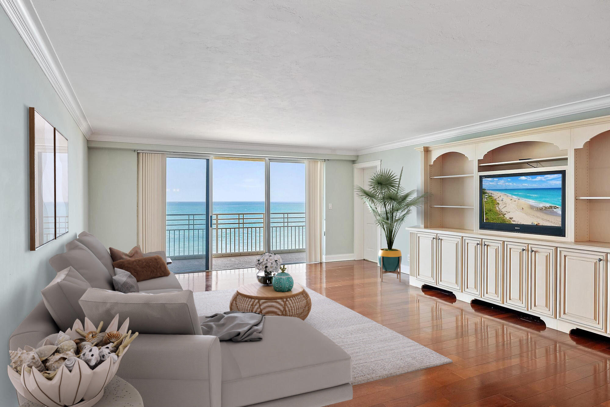 350 South Beach Road, Unit 503 Tequesta, FL 33469 - Photo 9 of 51 a living room with furniture and a large window with wooden floor