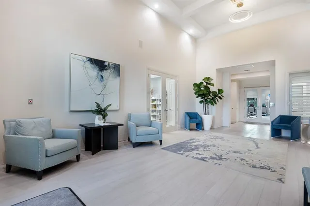 a view of a livingroom with hardwood and furniture