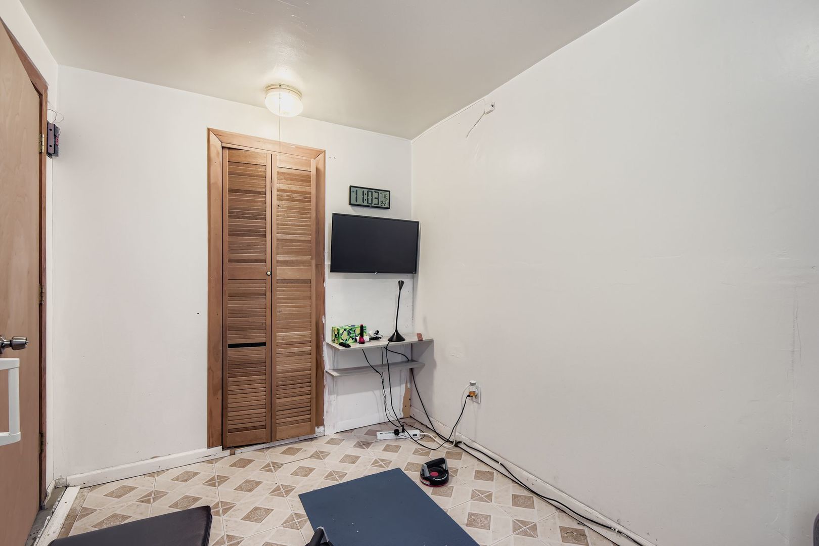 2453 South Trumbull Avenue Chicago, IL 60623 - Photo 18 of 21 a bathroom with a sink toilet and mirror