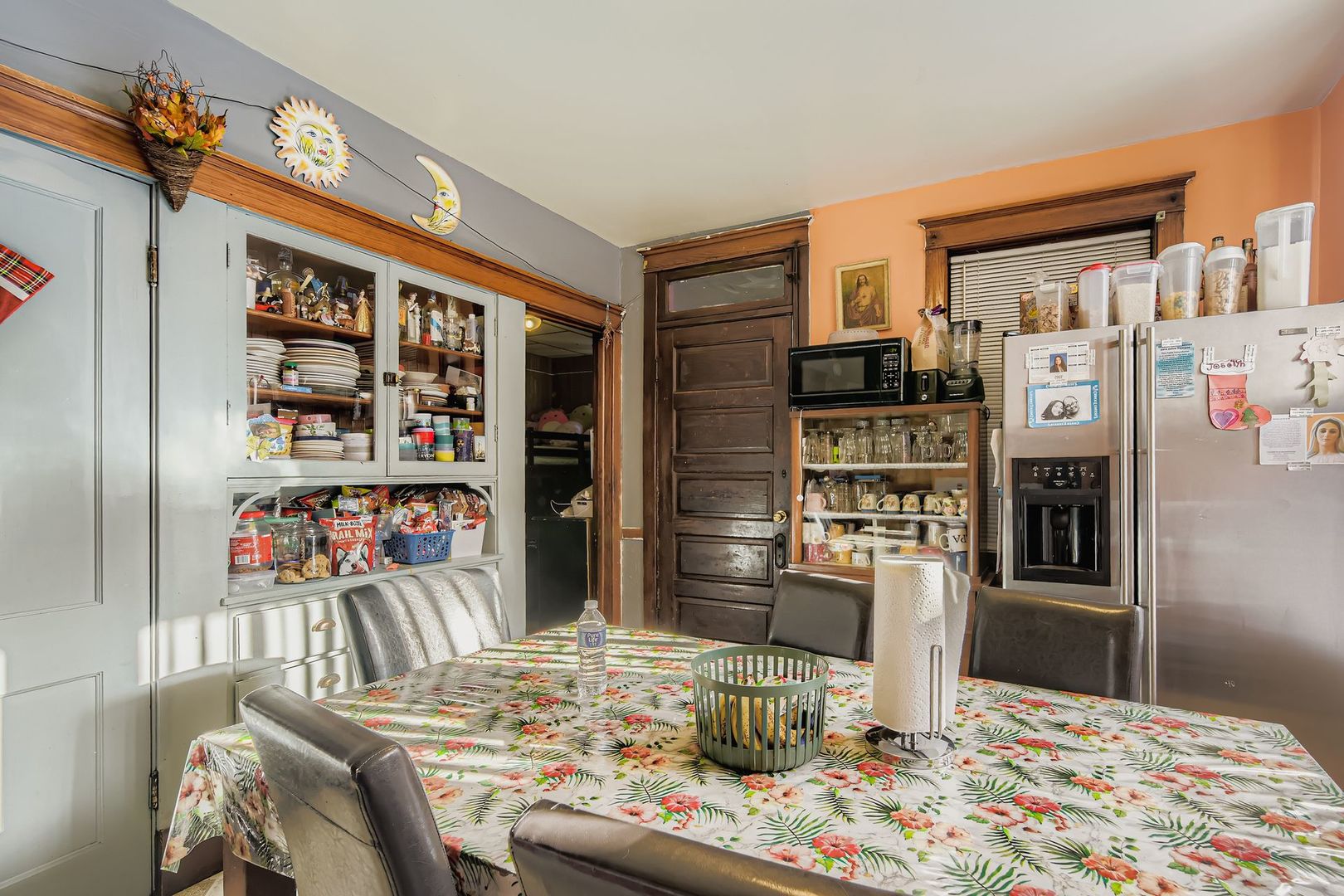 2453 South Trumbull Avenue Chicago, IL 60623 - Photo 7 of 21 a dining room with large window