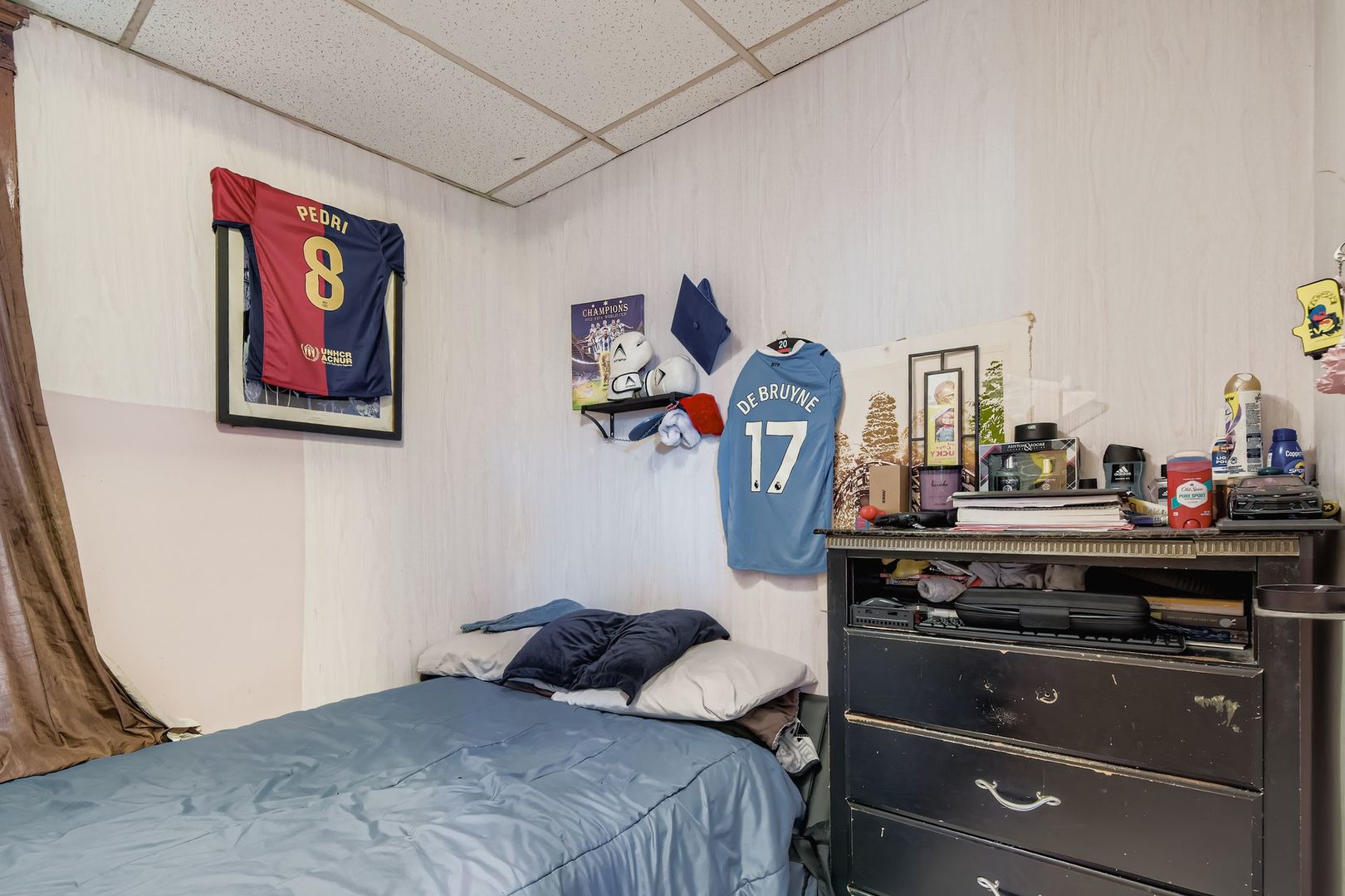 2453 South Trumbull Avenue Chicago, IL 60623 - Photo 10 of 21 a bedroom with a bed and a bookshelf