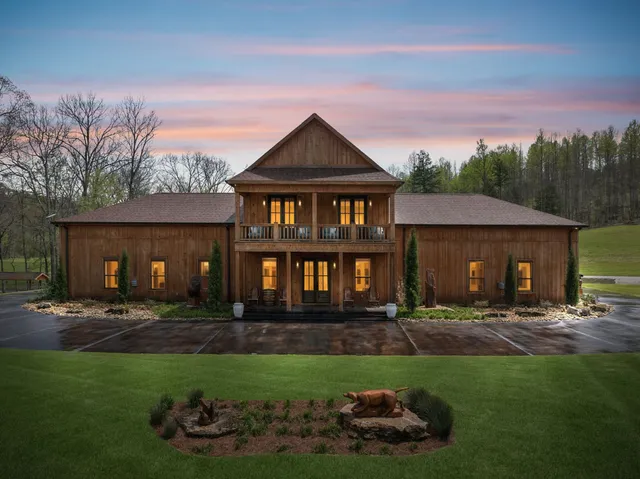 a view of a house with a tree