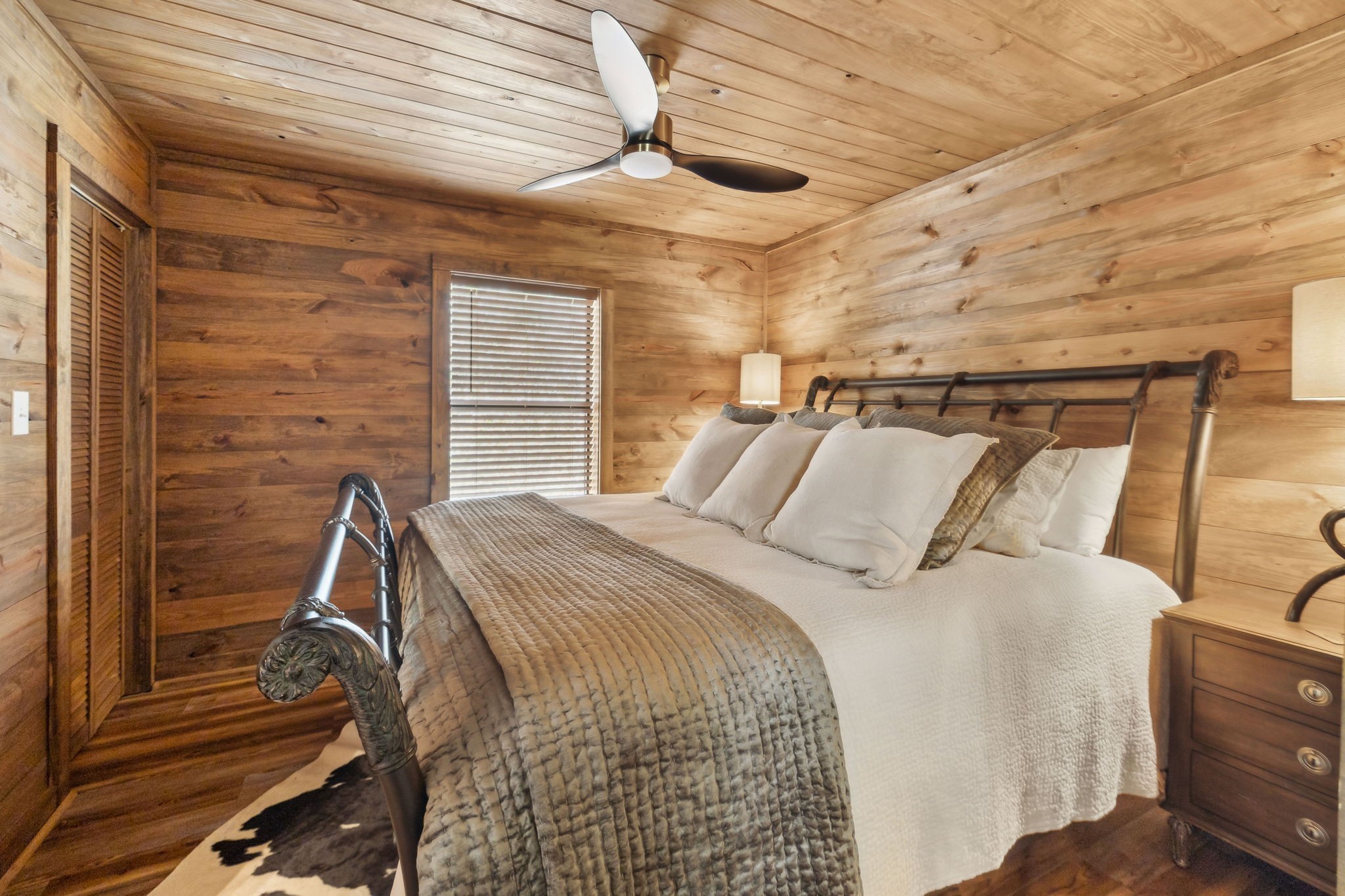 3105 Coy Hill Road Olivehill, TN 38475 - Photo 67 of 95 a bed sitting in a bedroom next to a window