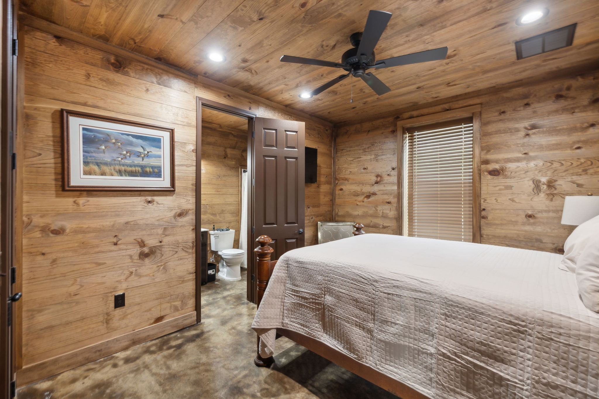 3105 Coy Hill Road Olivehill, TN 38475 - Photo 81 of 95 a bedroom with a bed and a walk in closet