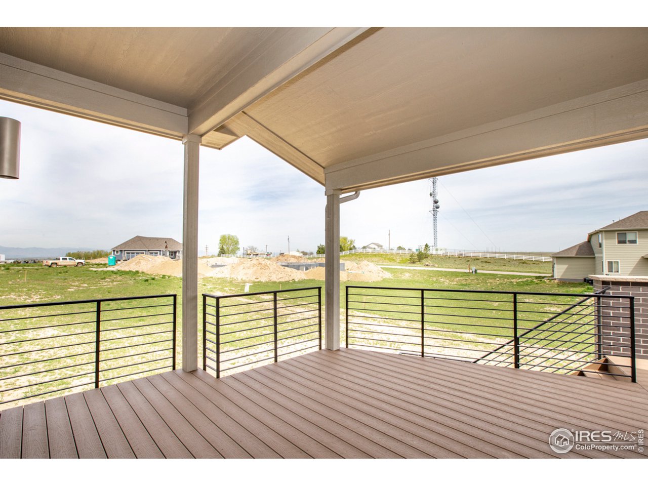 3818 Bridle Ridge Circle Fort Collins, CO 80524 - Photo 32 of 40 a view of an ocean from a balcony