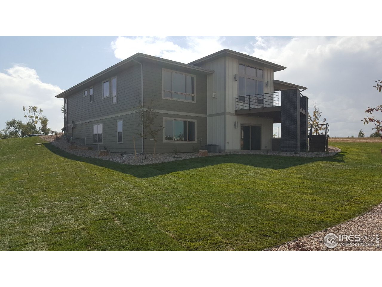 3818 Bridle Ridge Circle Fort Collins, CO 80524 - Photo 4 of 40 a black and white photo of a big room