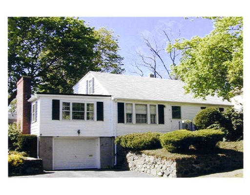 9 Hibbard Road Marblehead, MA 01945 - Photo 1 of 1 a front view of a house with a tree