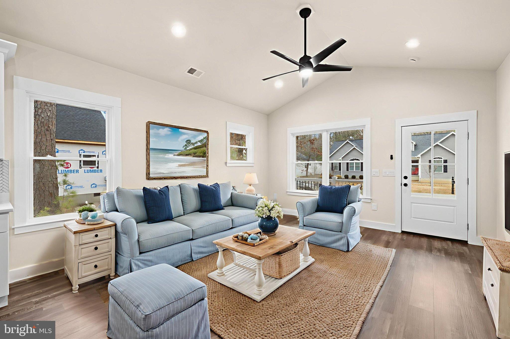 316 9th Street Colonial Beach, VA 22443 - Photo 3 of 59 a living room with furniture and wooden floor