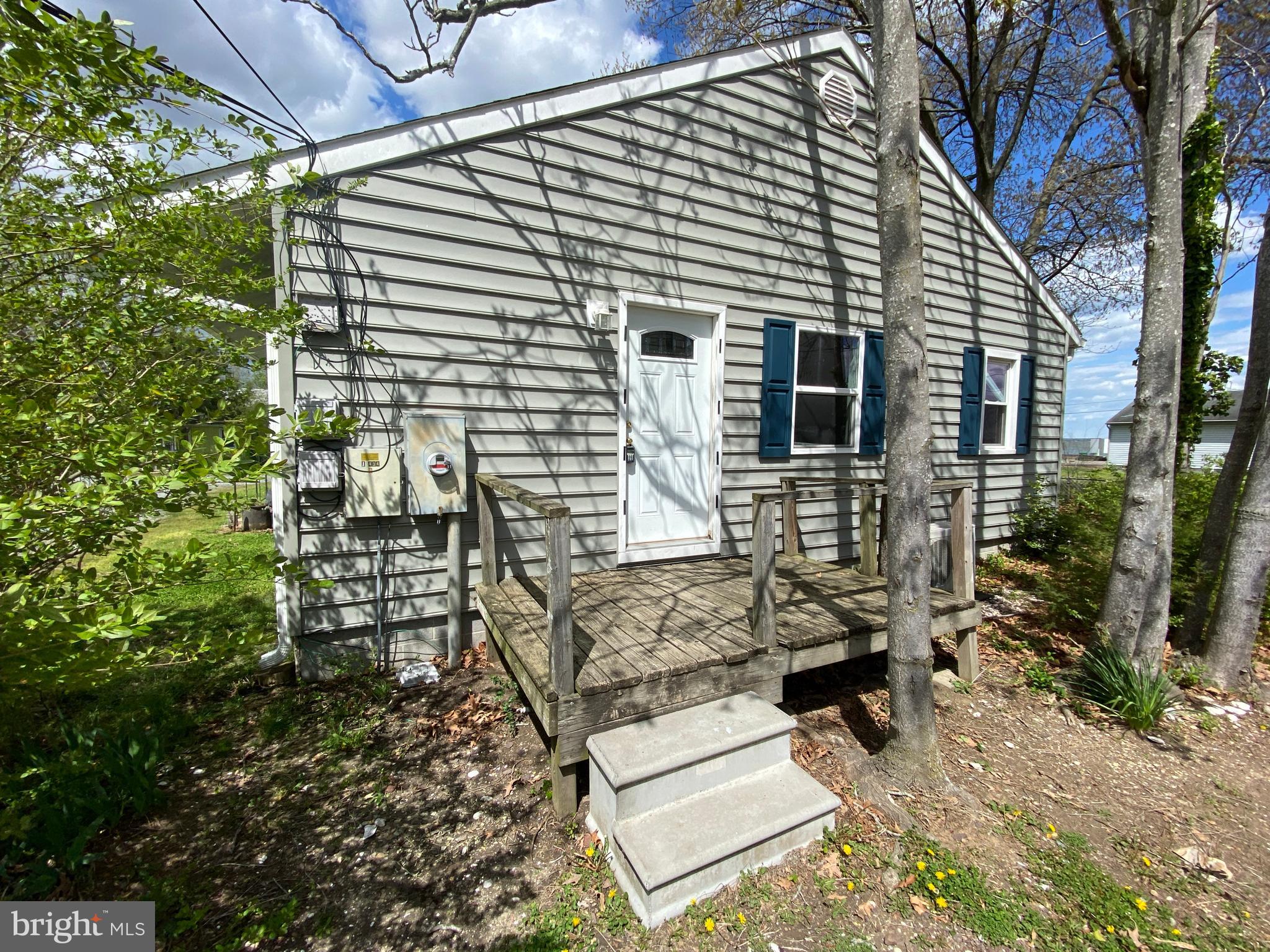 201 North Irving Avenue, Unit B Colonial Beach, VA 22443 - Photo 1 of 8 a view of a house with backyard