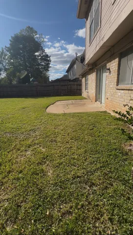 a view of outdoor space and yard