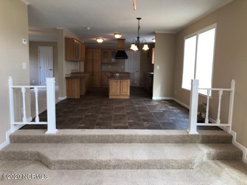 6349 Nicole Road Spring Hope, NC 27882 - Photo 7 of 24 Step-down Den - view towards Dining Room & Kitchen