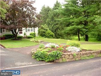 139 Buckwalter Road Pottstown, PA 19465 - Photo 2 of 8 a view of a garden with a tree