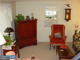 139 Buckwalter Road Pottstown, PA 19465 - Photo 4 of 8 a living room with furniture and a potted plant