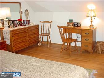 139 Buckwalter Road Pottstown, PA 19465 - Photo 6 of 8 a dining room with furniture and a wooden floor