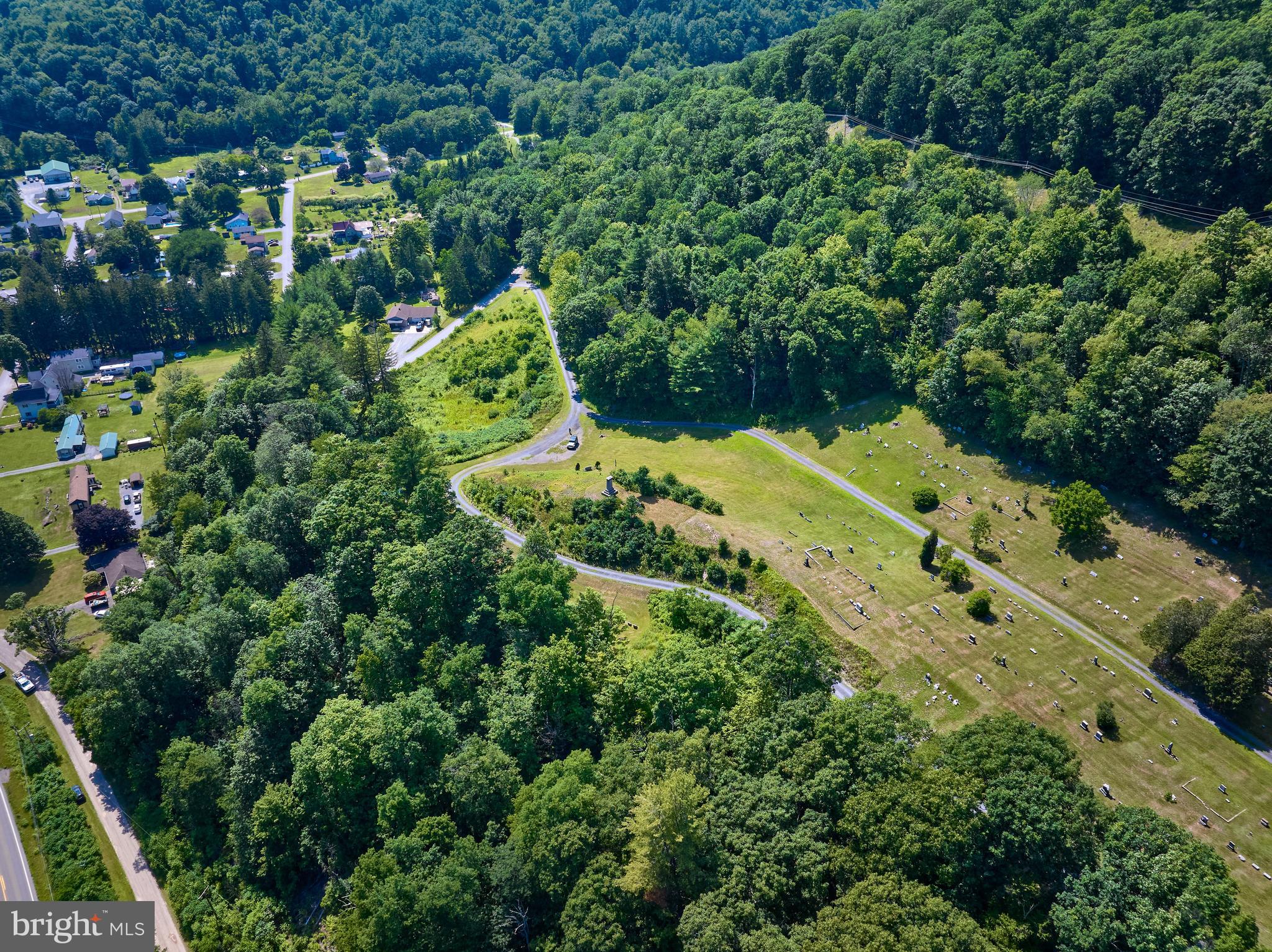 0 Peepaw Road Roaring Branch, PA 17765 - Photo 17 of 47 an aerial view of houses with yard and outdoor seating