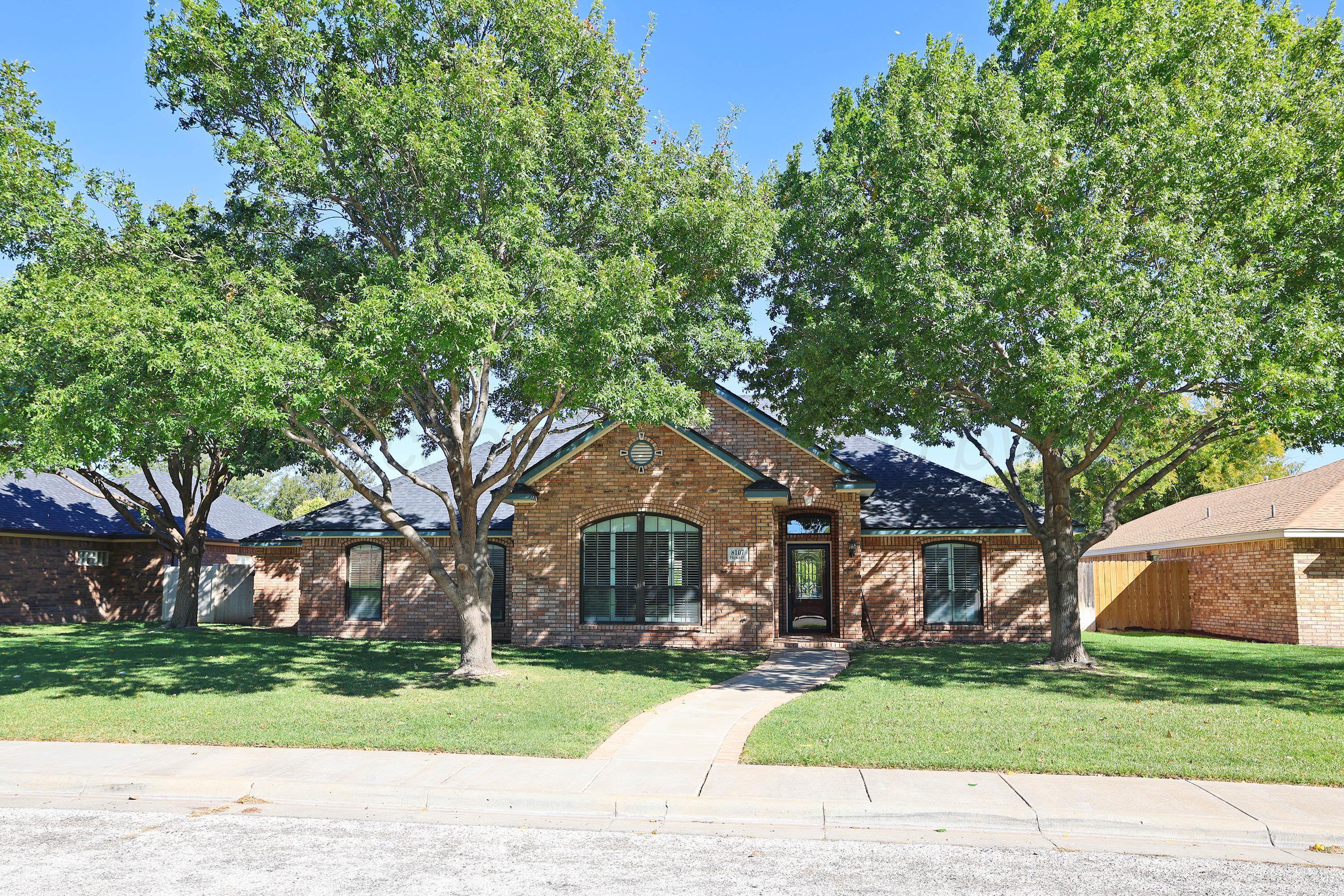 a house view with a garden space
