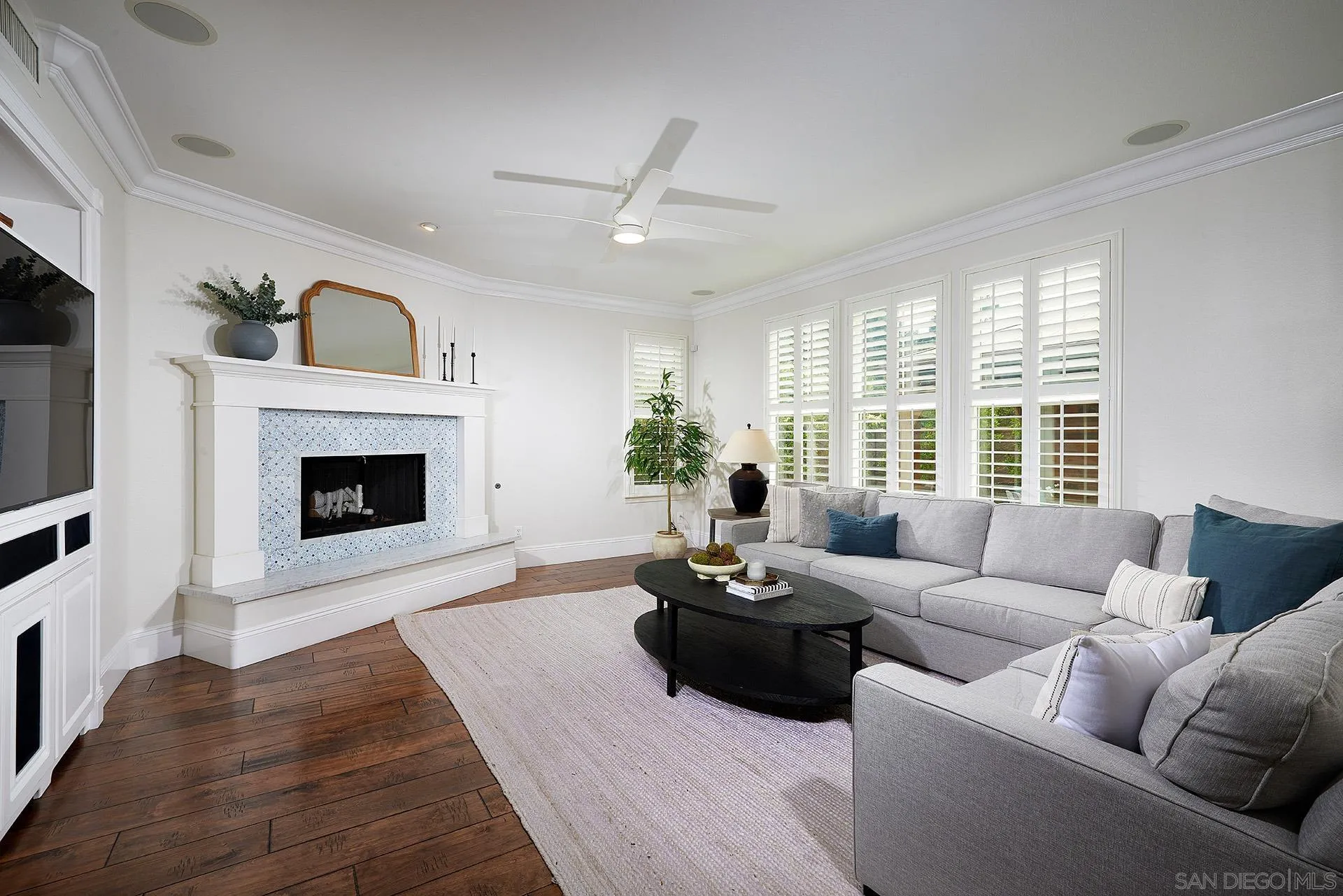 3501 Corte Romero Carlsbad, CA 92009 - Photo 11 of 48 a living room with furniture and a fireplace