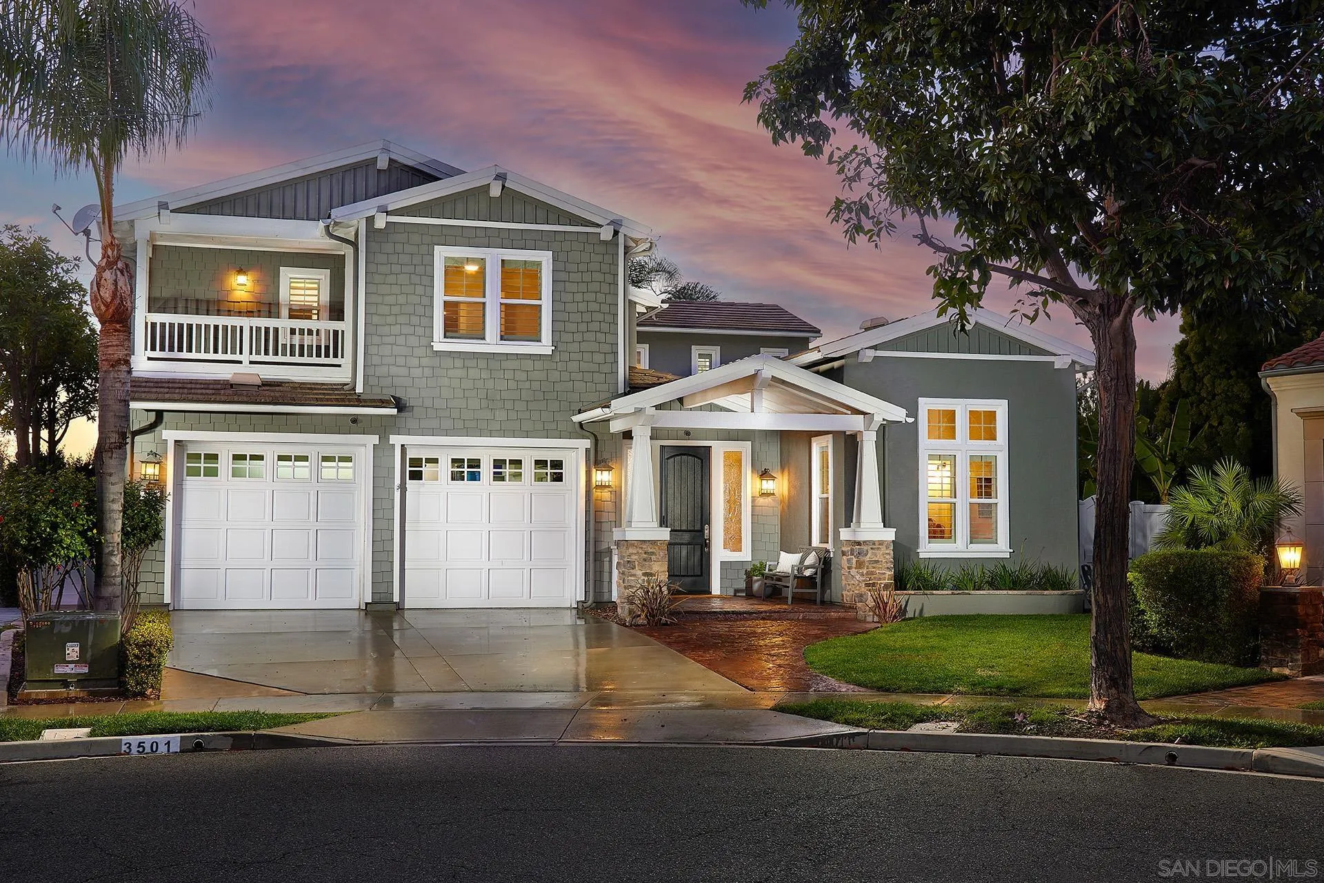 3501 Corte Romero Carlsbad, CA 92009 - Photo 2 of 48 a front view of a house with a yard