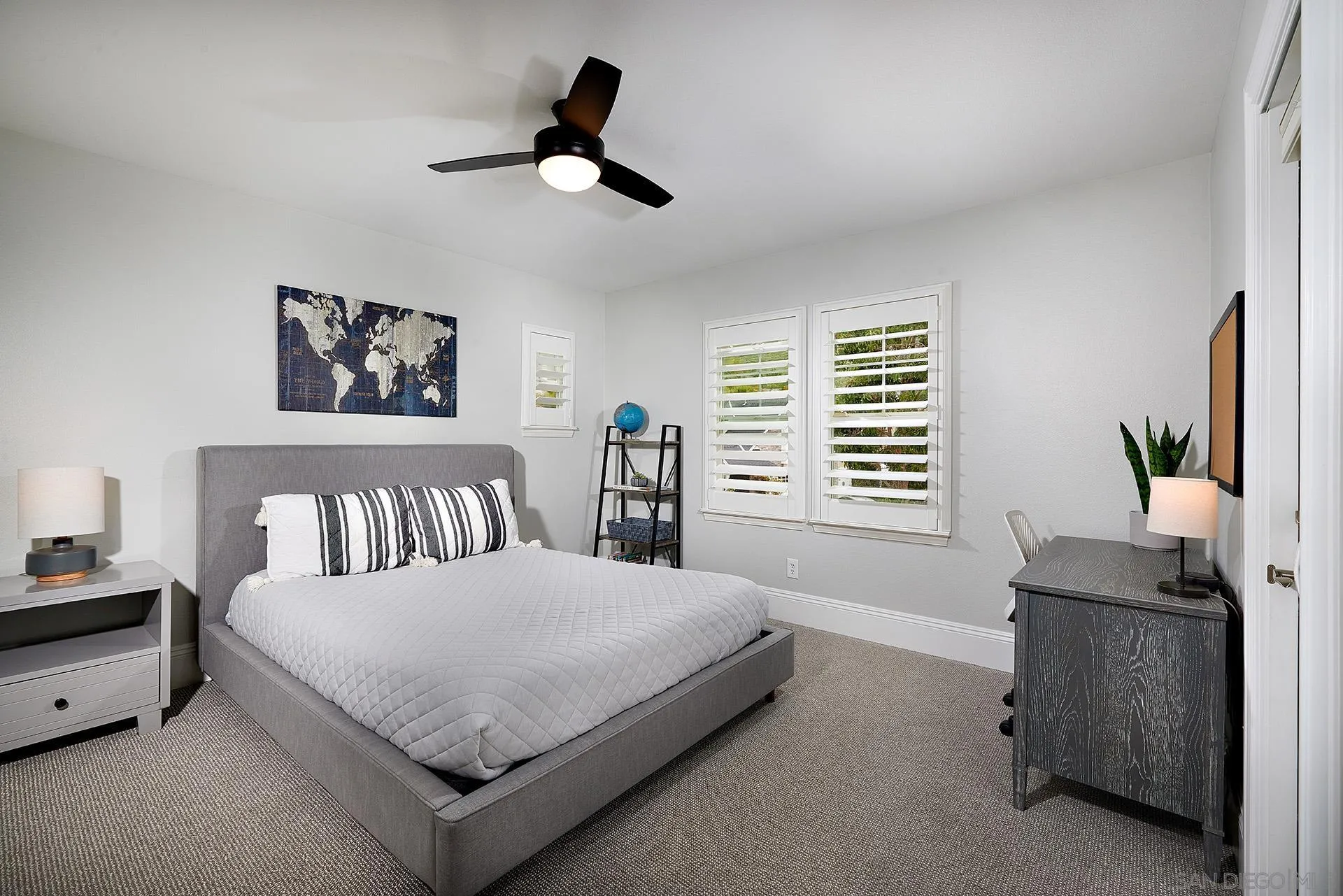 3501 Corte Romero Carlsbad, CA 92009 - Photo 24 of 48 a bed sitting in a bedroom next to a window