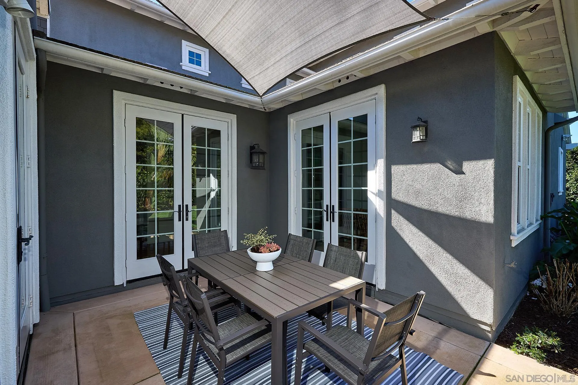 3501 Corte Romero Carlsbad, CA 92009 - Photo 37 of 48 a backyard of a house with table and chairs