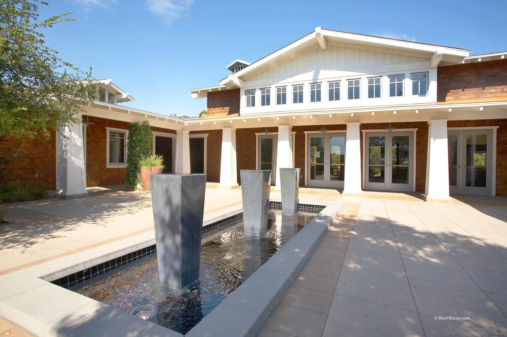 3501 Corte Romero Carlsbad, CA 92009 - Photo 42 of 48 a front view of a house with a yard