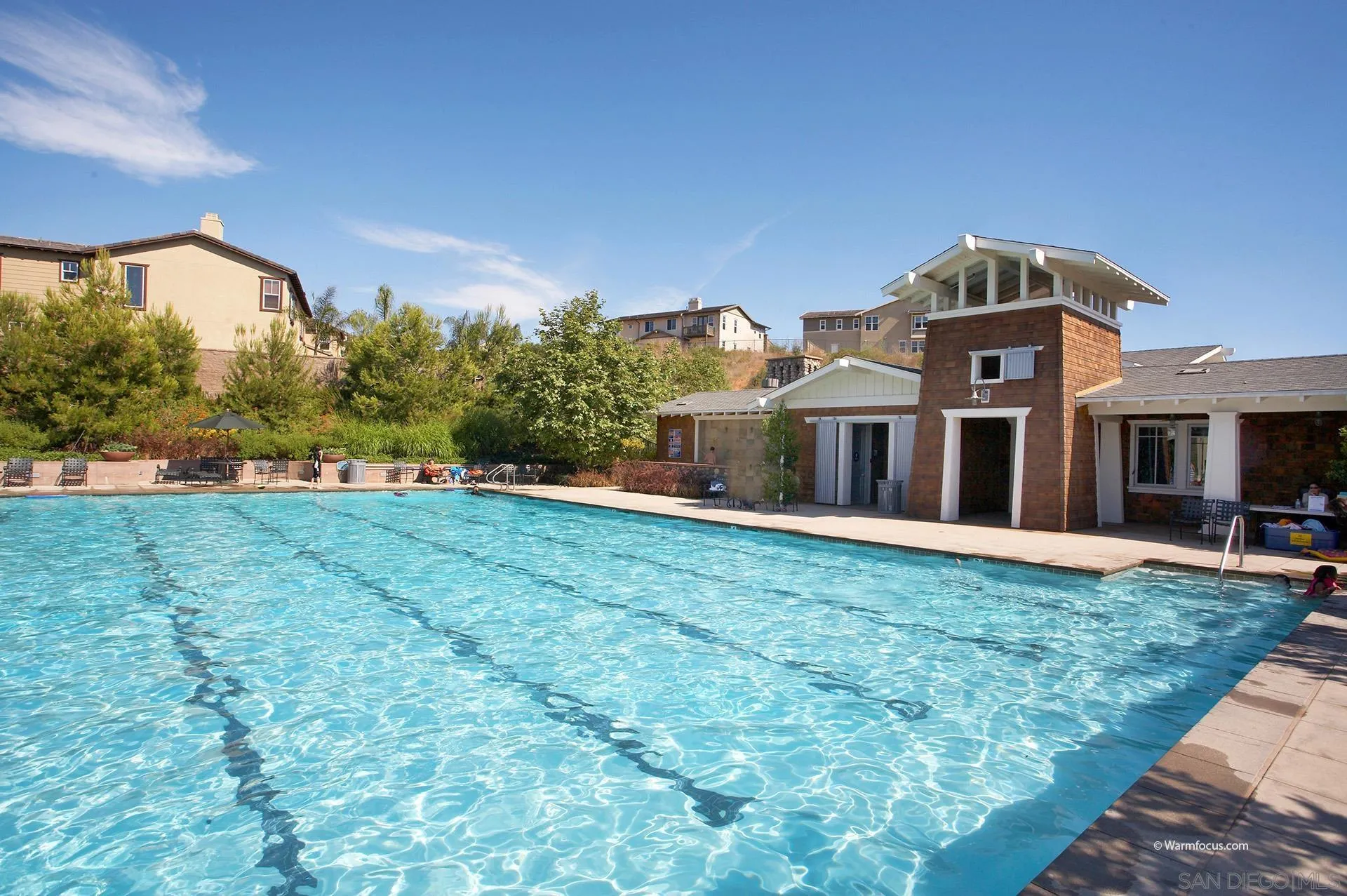 3501 Corte Romero Carlsbad, CA 92009 - Photo 44 of 48 a front view of house with yard and trees in the background