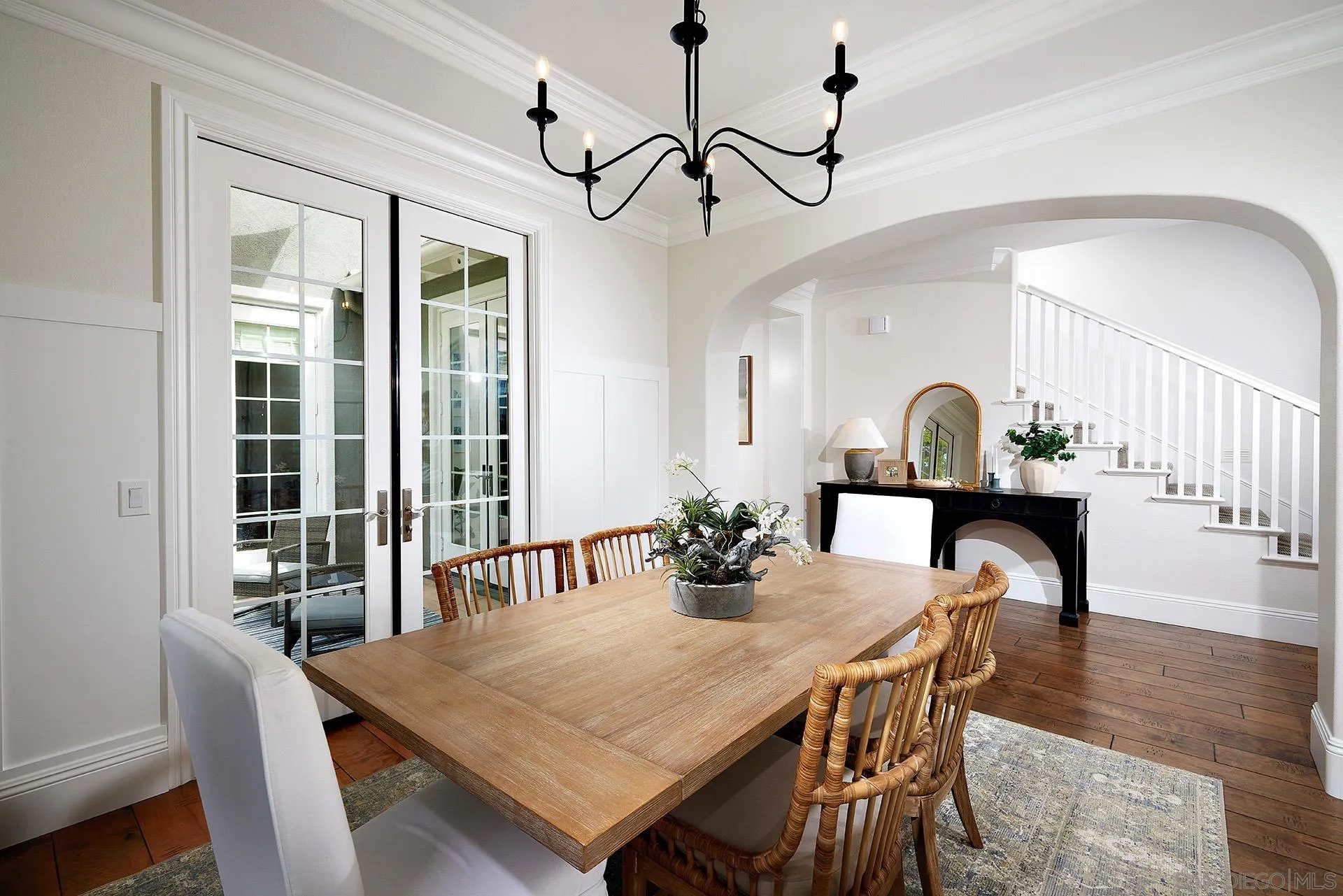 3501 Corte Romero Carlsbad, CA 92009 - Photo 8 of 48 a view of a dining room with furniture and wooden floor