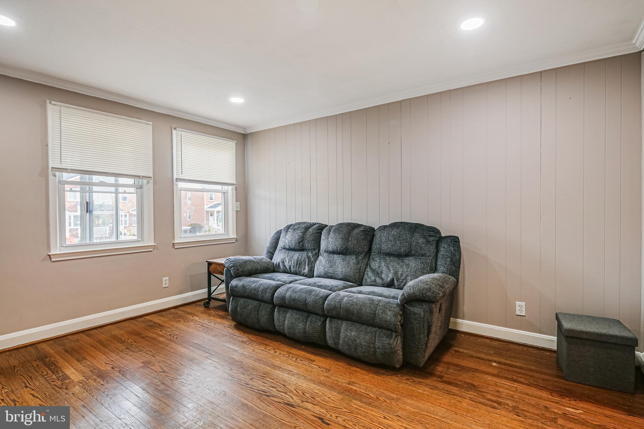 1027 Elm Road Baltimore, MD 21227 - Photo 8 of 36 a living room with furniture and a window