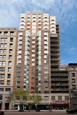 a view of a chair and table in the patio