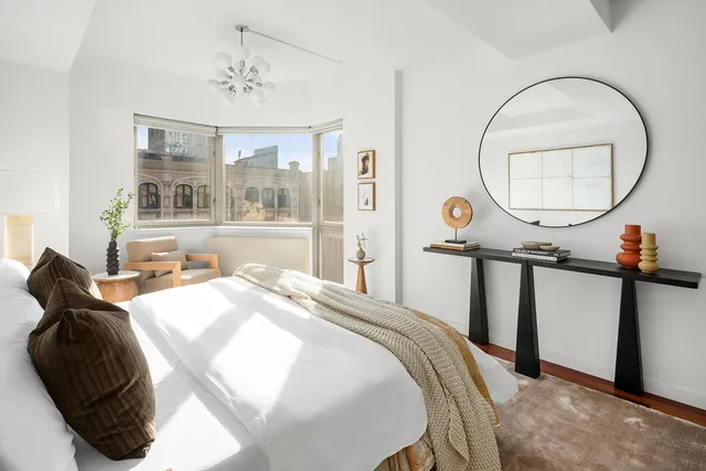 a kitchen with stainless steel appliances granite countertop a refrigerator a stove top oven a sink and dishwasher