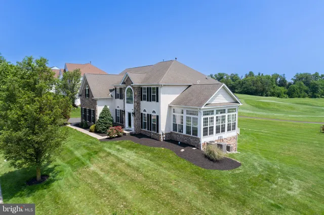 a view of a house with a big yard