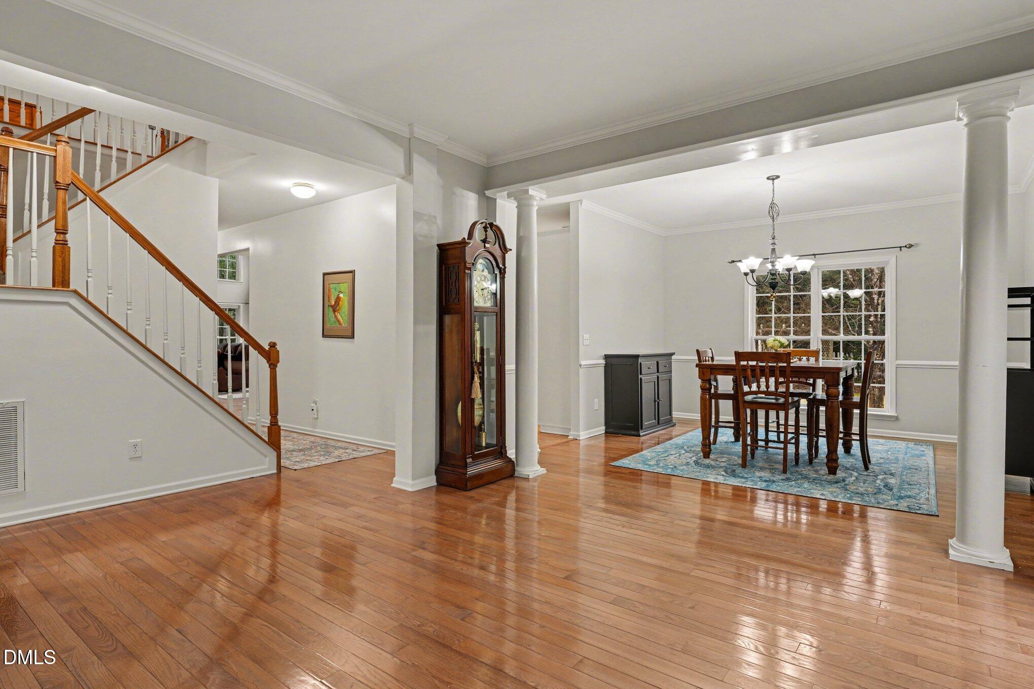 2505 Wyatt Lane Raleigh, NC 27614 - Photo 10 of 54 a dining room with furniture entryway and wooden floor