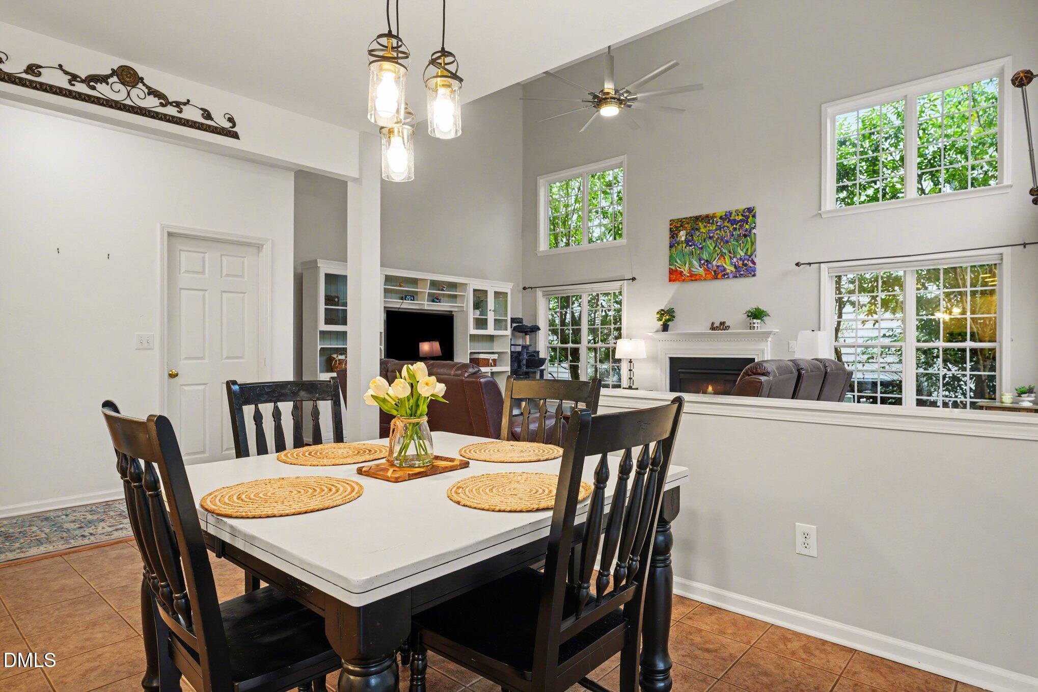 2505 Wyatt Lane Raleigh, NC 27614 - Photo 17 of 54 a view of a dining room with furniture window and wooden floor