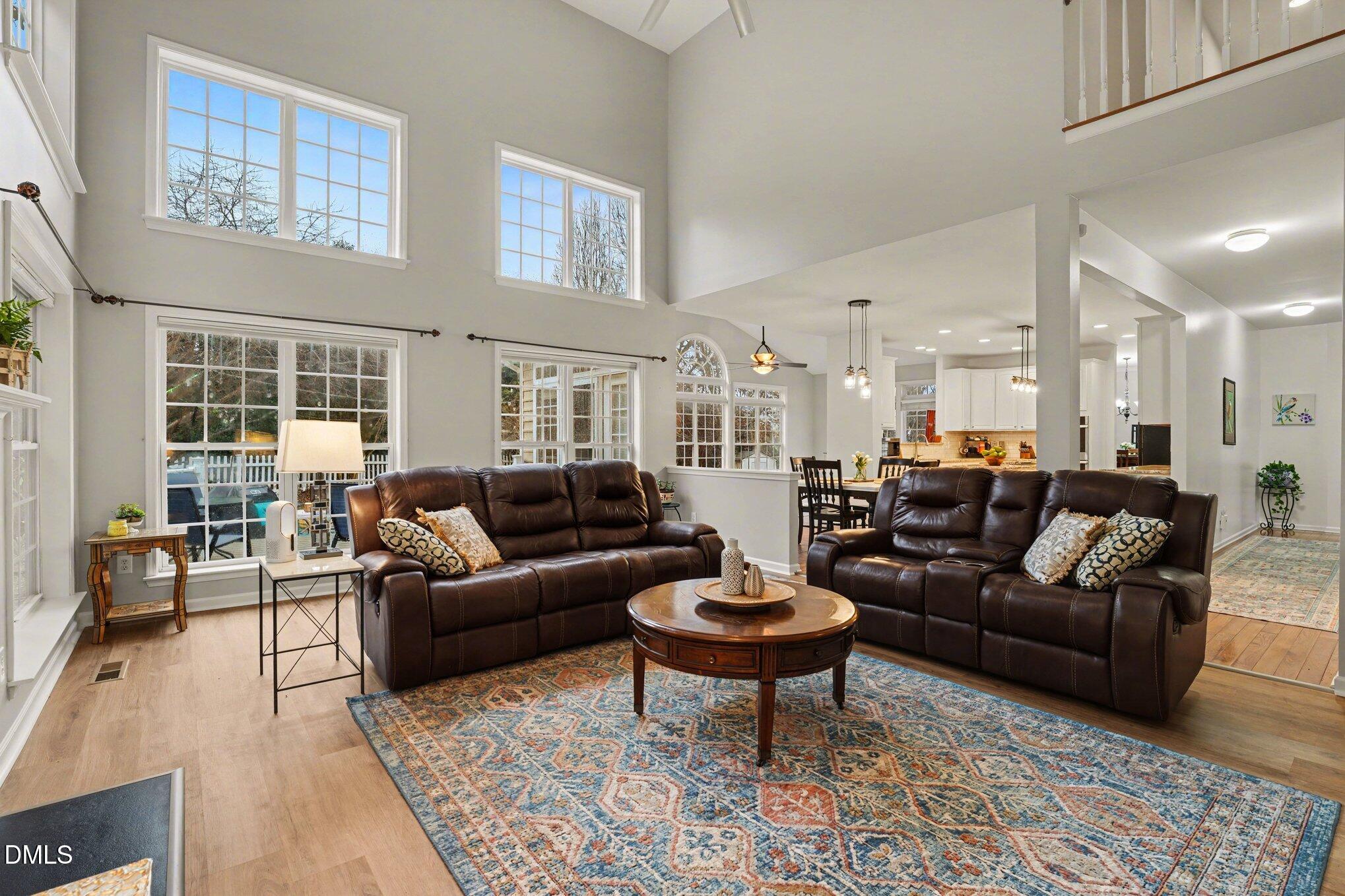 2505 Wyatt Lane Raleigh, NC 27614 - Photo 18 of 54 a living room with furniture a rug and a window