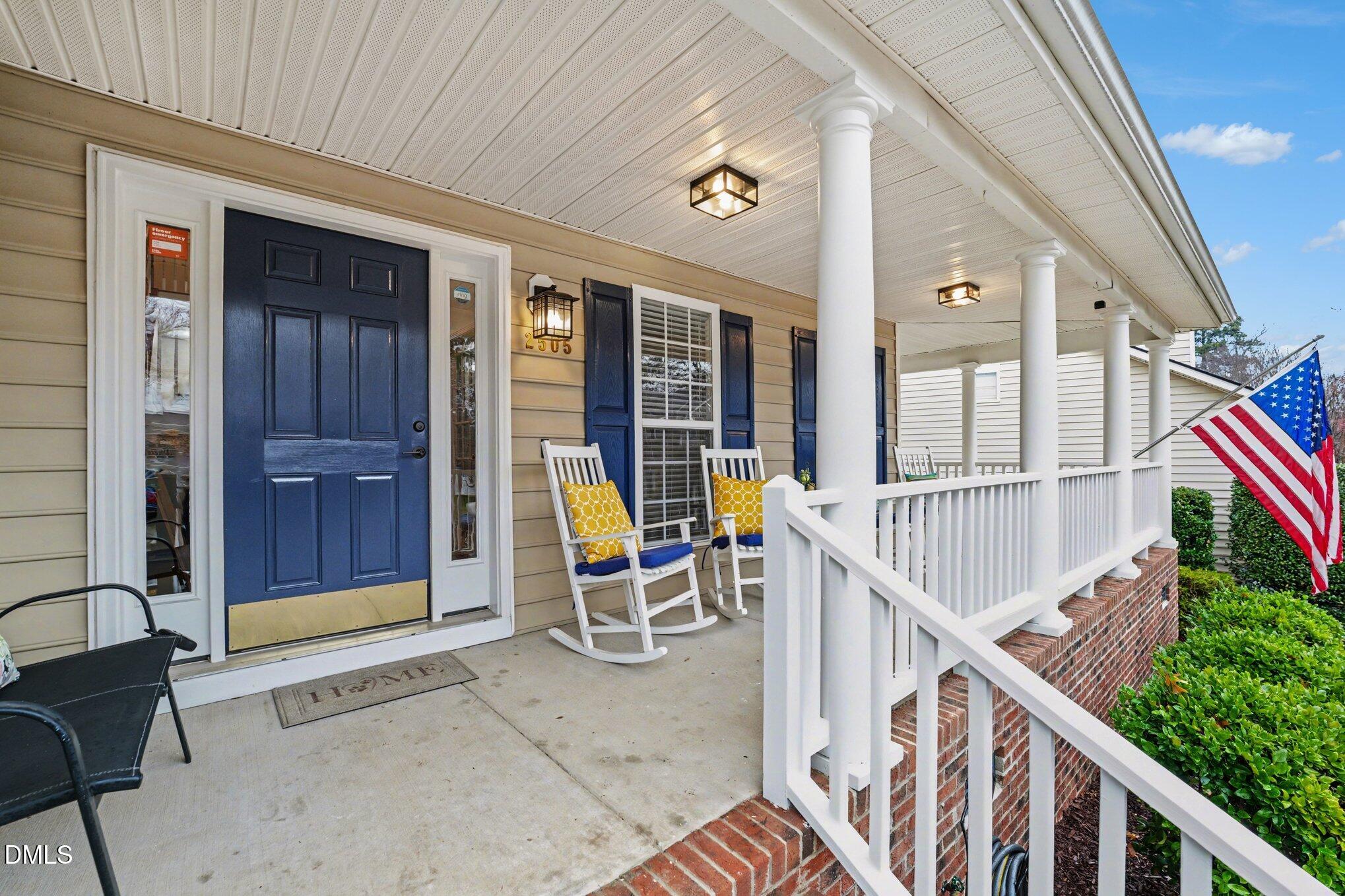 2505 Wyatt Lane Raleigh, NC 27614 - Photo 32 of 54 a view of an entryway with wooden floor and stairs