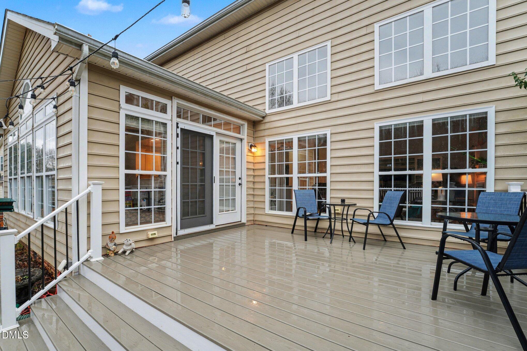 2505 Wyatt Lane Raleigh, NC 27614 - Photo 33 of 54 a view of a patio with table and chairs