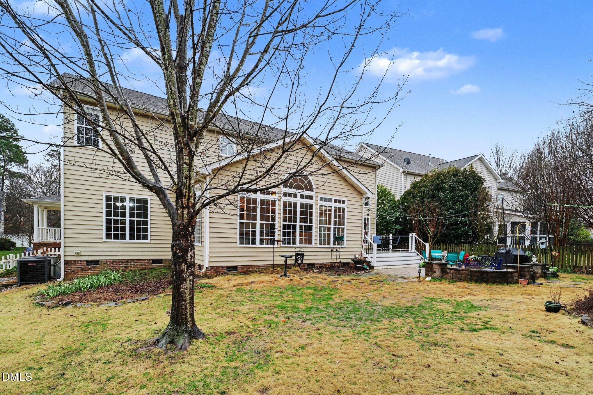 2505 Wyatt Lane Raleigh, NC 27614 - Photo 37 of 54 a view of a house with a yard covered in snow