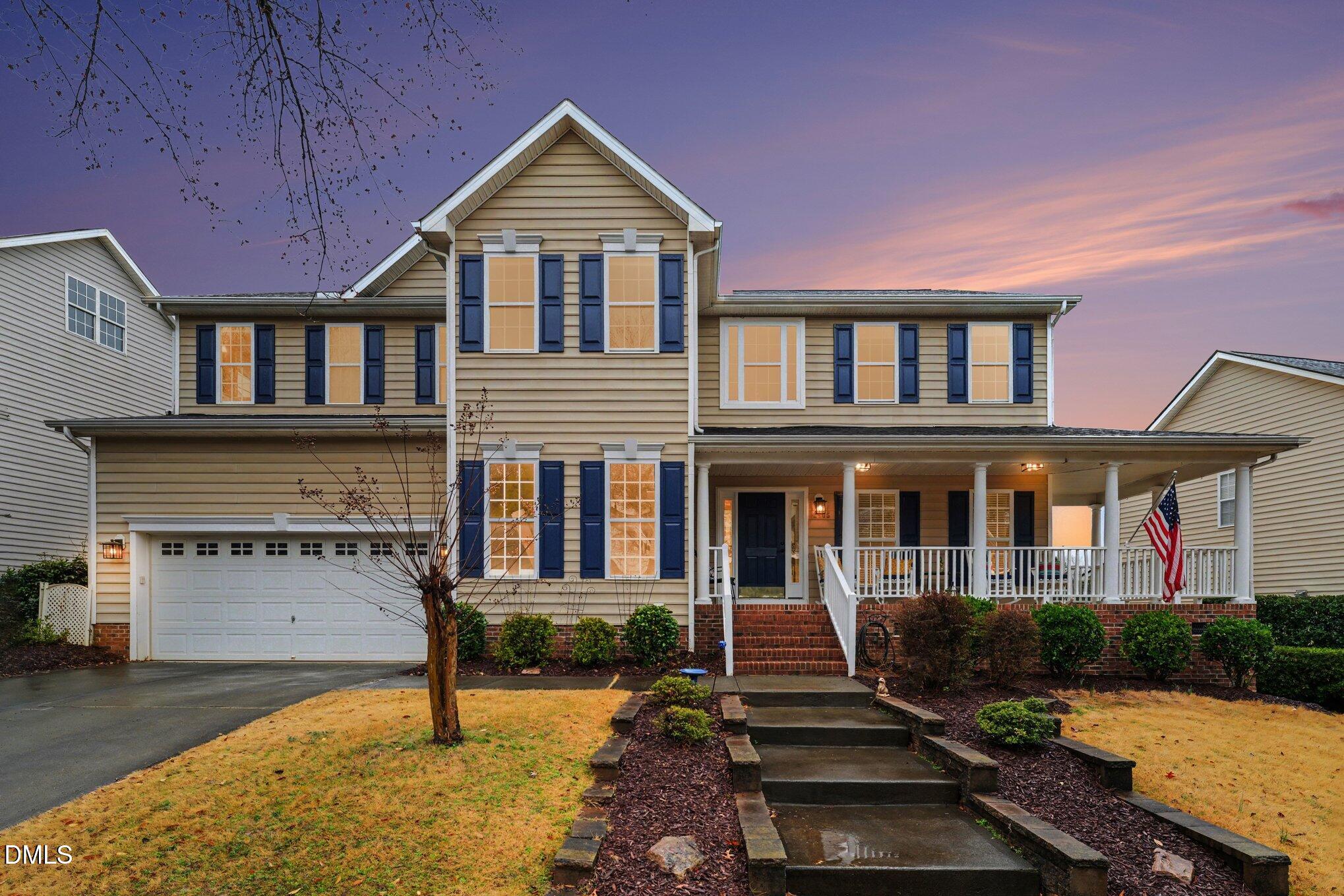2505 Wyatt Lane Raleigh, NC 27614 - Photo 51 of 54 a front view of a house with a yard